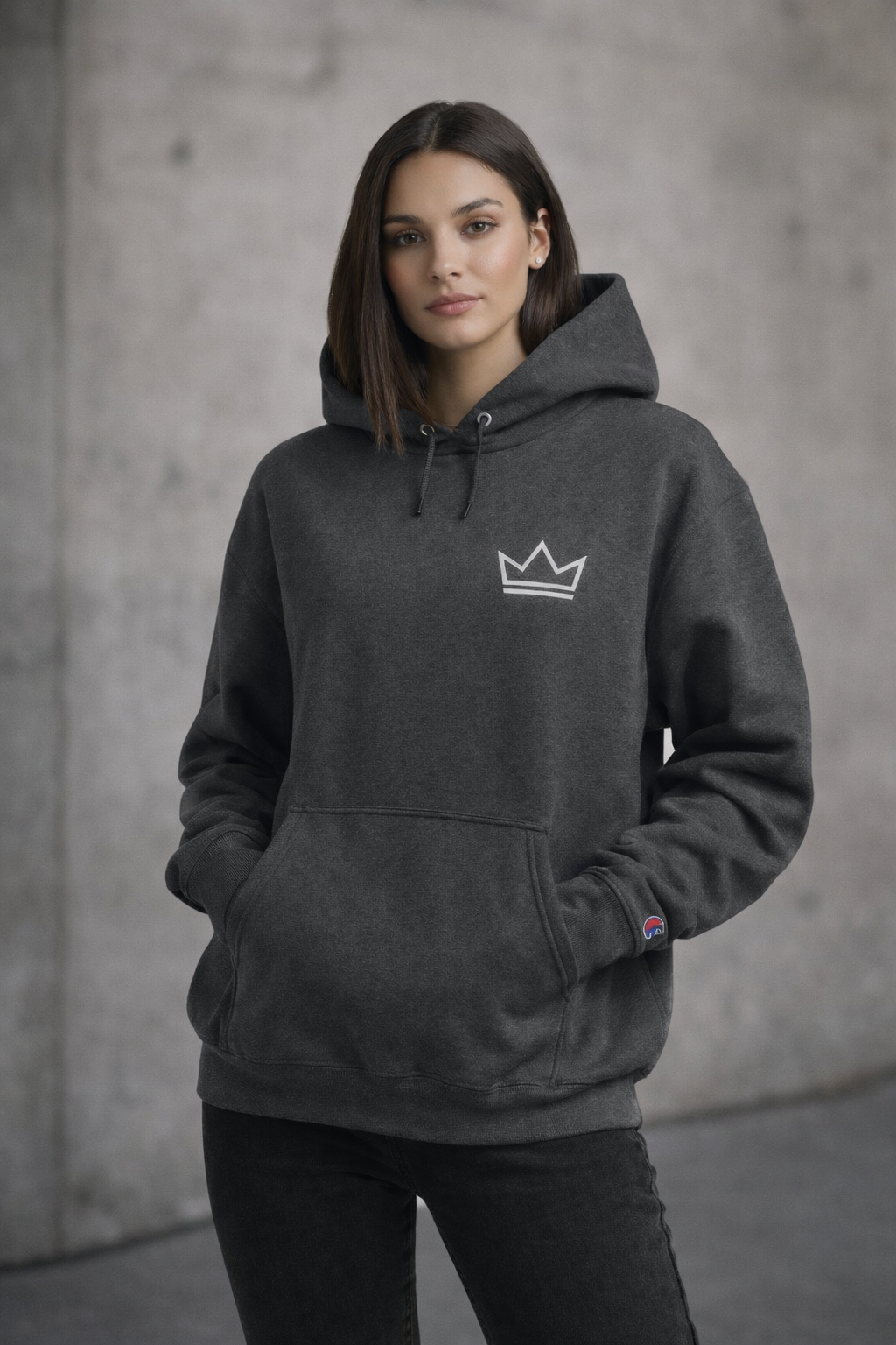 Female model wearing women's minimalist charcoal PurposeDriven crown hoodie streetwear
