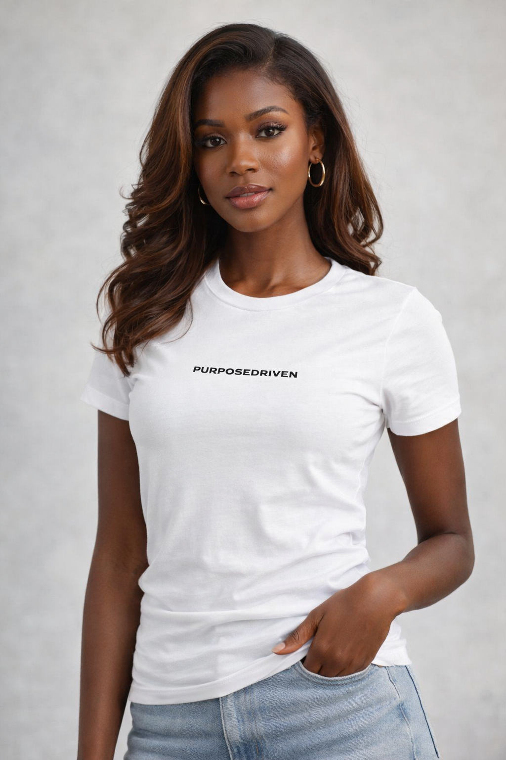 Woman wearing white minimalist logo t-shirt, modern motivational streetwear style on neutral background
