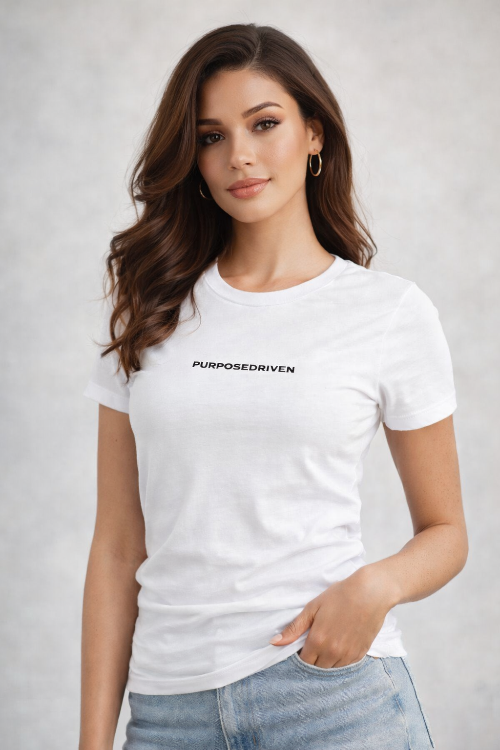 Woman wearing white minimalist logo t-shirt, modern motivational streetwear fit on neutral background