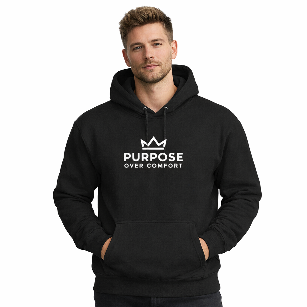Male model wearing black Purpose Over Comfort hoodie with crown logo on plain white background, minimalist motivational streetwear