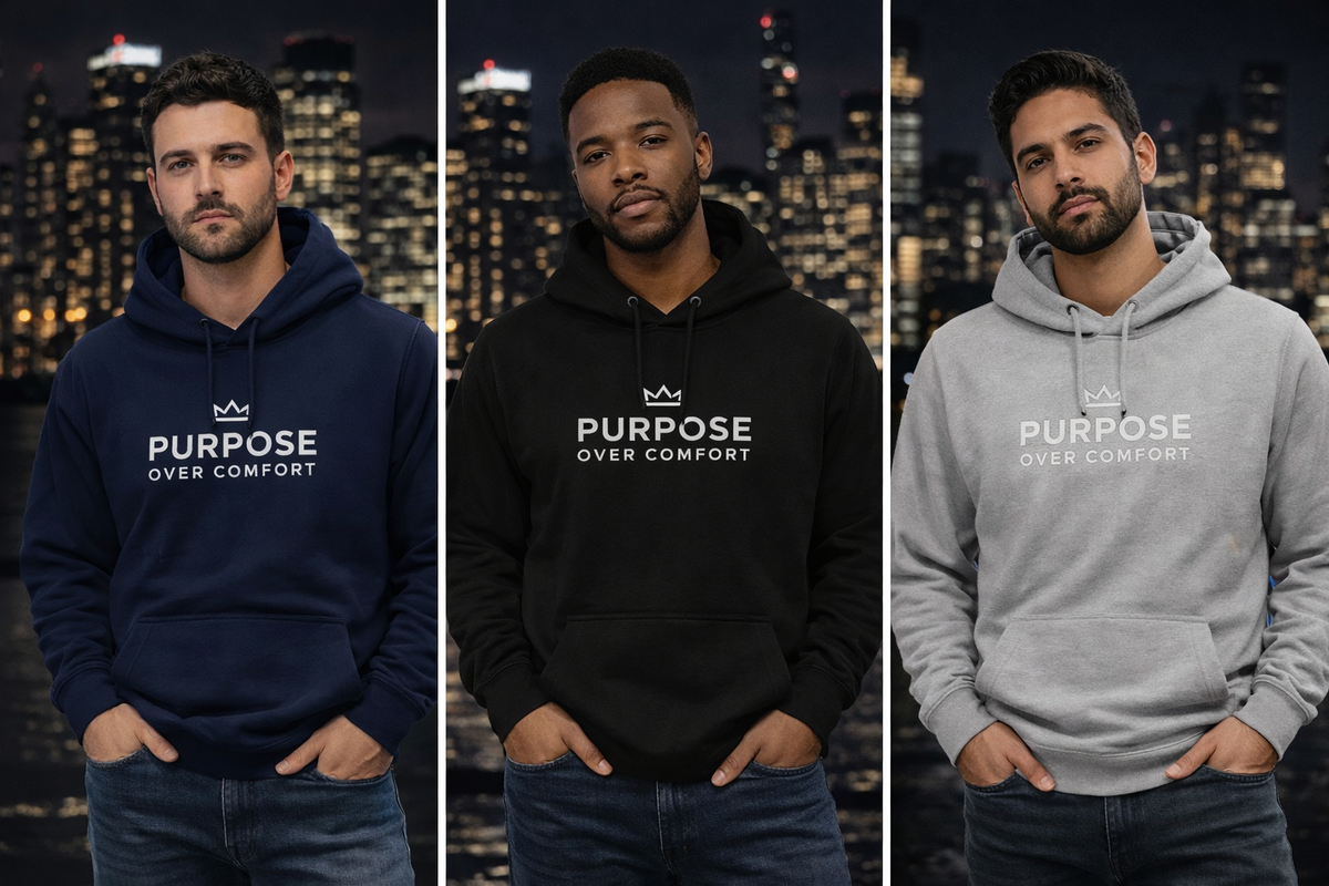 Three men wearing Purpose Over Comfort hoodies in navy, black, and grey, minimalist motivational streetwear photographed at night with city skyline backdrop