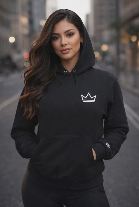 Minimalist streetwear video showing models wearing black and grey hoodies and t-shirts with a crown logo, standing in a clean modern retail-style environment.